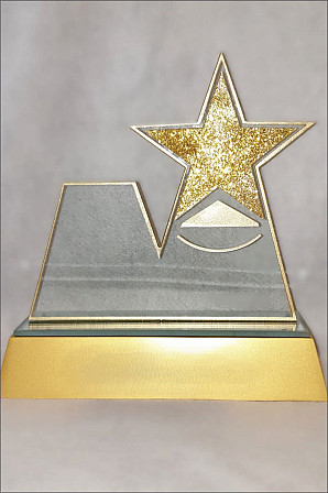 Profile cut glass with a glitter Gold star